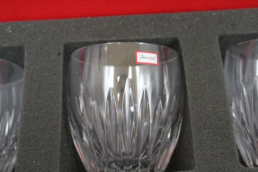 A boxed set of six Baccarat cut glass whisky tumblers, height 9cm, diameter 8cm